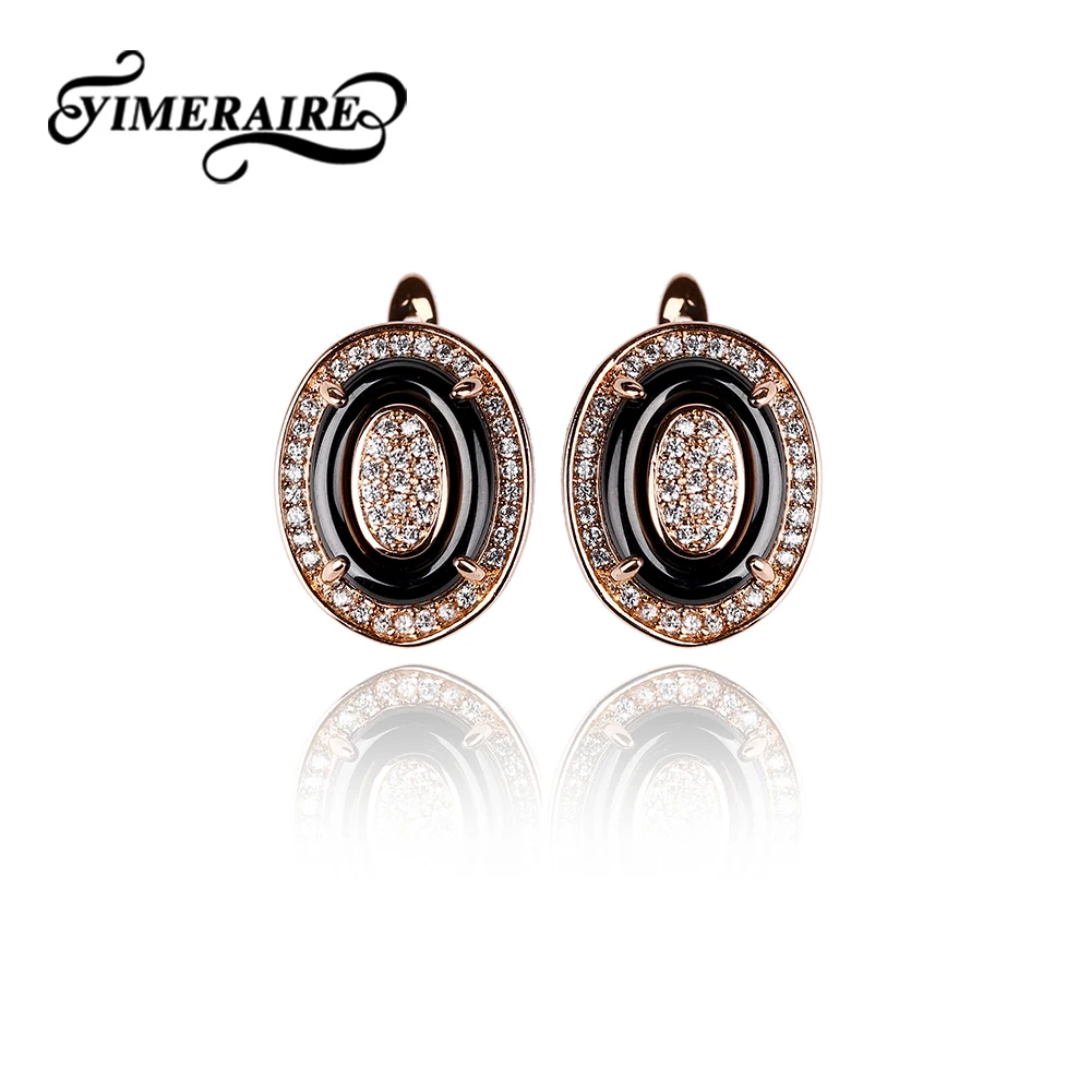 Серьги в форме U из розового золота овальные с черными керамическими и блестящими