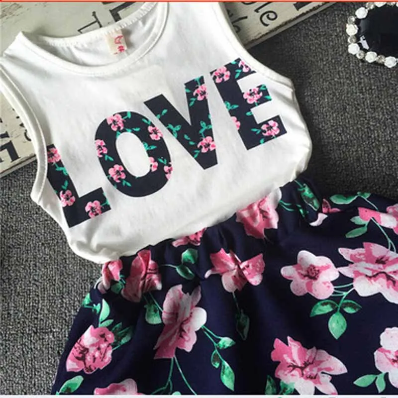 

New Fashion Summer Children's Clothing Girls Print Letters Flower Sleeveless Vest Top+ Floral Skirt 2 Pcs Suit Toddler Set 3-10T