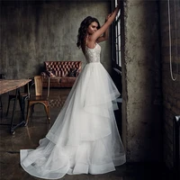 2021 sexy spaghetti strips a line wedding dresses lace appliques top spring beach bridal gowns tiered ladies bride party wear