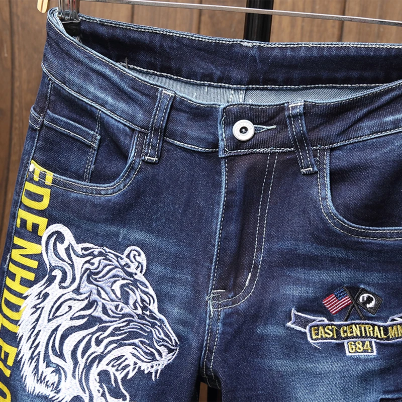 

2021 New Spring and Summer Men's Jeans Slim Trousers Blue Motorcycle Print Jeans Men's Tight Casual Fashion Sports Pants