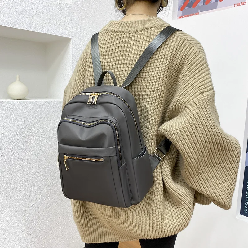 

Famous Brand Casual Oxford Backpacks for Women 2021 New Zip Backpacks Textile School Bags for Teenage Girls Luxury Bagpack