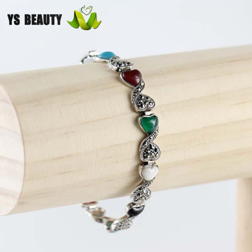 Браслет из серебра 925 пробы с инкрустированными цветными драгоценными камнями