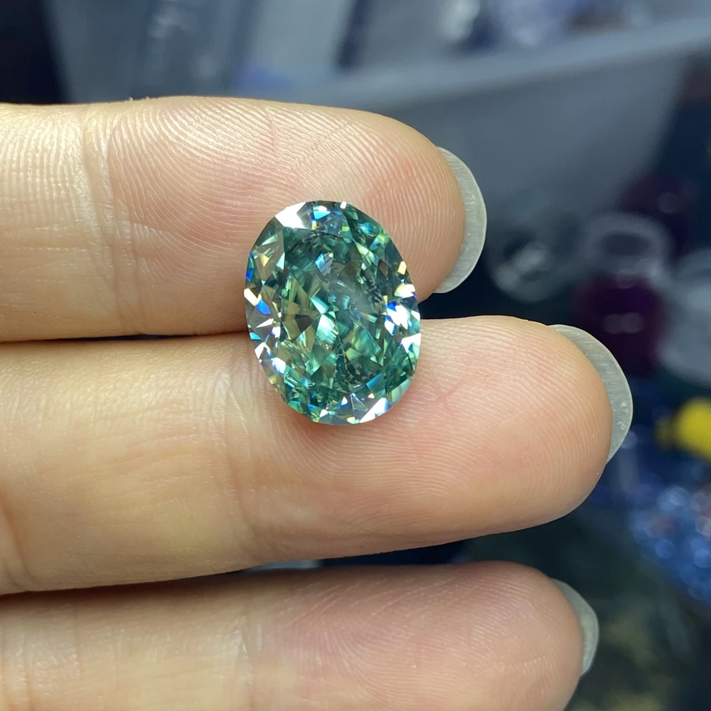 

Ice Crushed 9x7mm 2.5 Carat Oval Shape Lab Created Blue-Green Color GRA Moissanite Diamond Stone for Engagement Ring Making