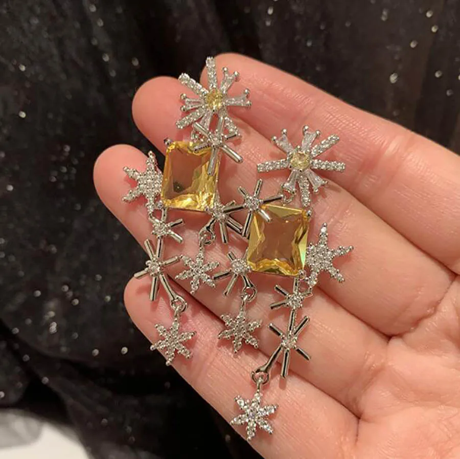 

Candy color snowflake earrings sweet elegant ins hollow exaggerated flower gorgeous women banquet yellow gem long eardrop