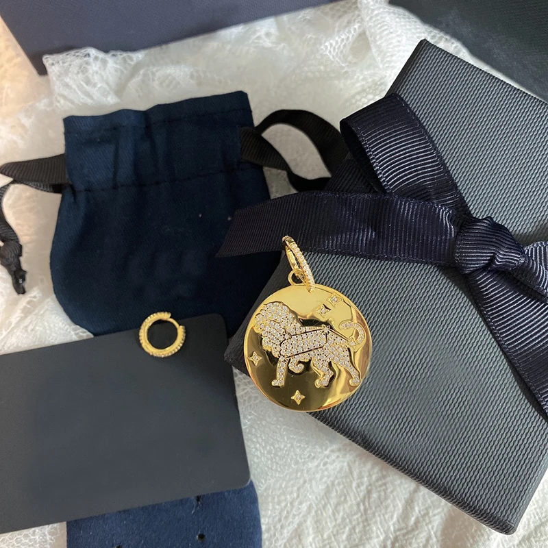 

S925 sterling silver spring and autumn new golden yellow Leo asymmetric earrings female fashion constellation design jewelry