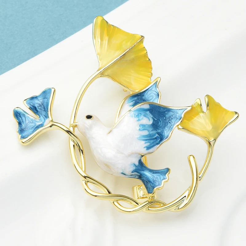 

Wuli&Baby Enamel Ginkgo And Dove Brooches Women Bird Carry Leaves Party Office Peace Brooch Pins Gifts