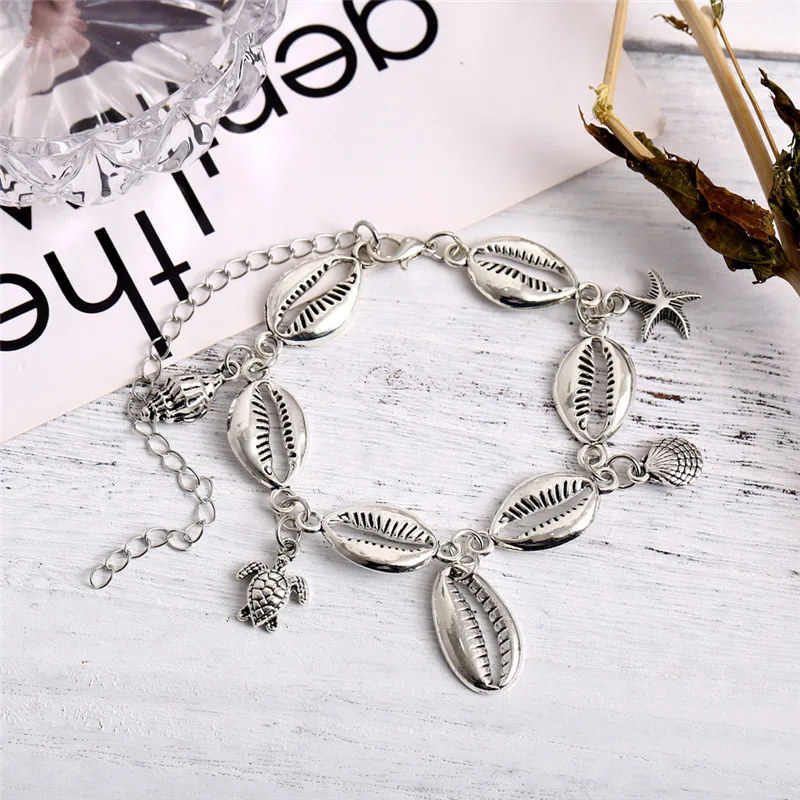 Женский винтажный браслет с кисточками серебристого цвета массивный черепахой