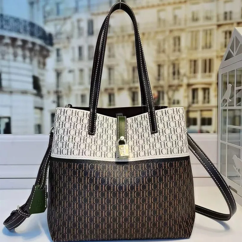 

Женская сумка-мешок из 100% воловьей кожи, новинка 2021, модные женские тоуты на одно плечо, роскошные брендовые дизайнерские кошельки с каналам...