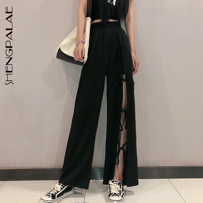 Женские повседневные брюки SHENGPALAE черные свободные с высокой талией и вырезами в