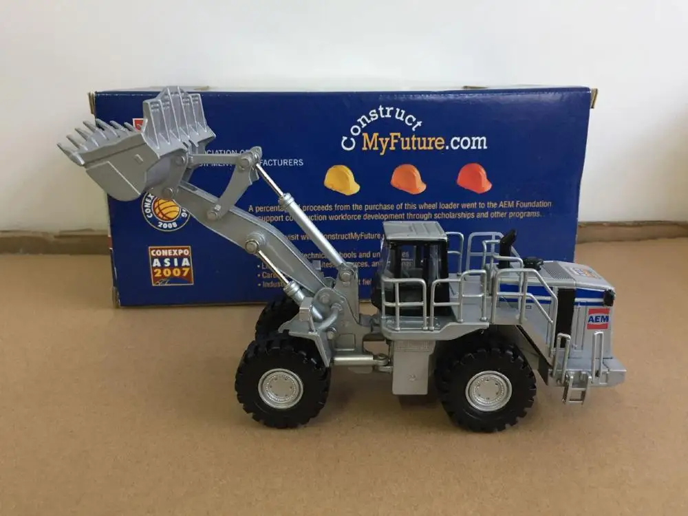 

AEM Wheel Loader Silver Limited Edition By Norscot 1:64 Collectible Die-Cast