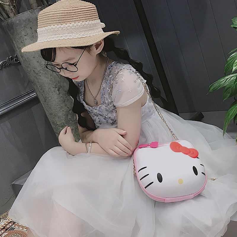 Подарок на день рождения - сумка через плечо принцессы с цепочкой и рисунком Hello Kitty для девочки.