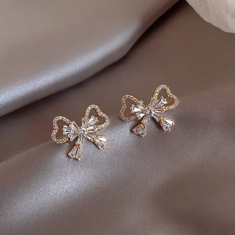 

E002 S925 silver zircon bow earrings Korean temperament online celebrity earrings female diamond exquisite commuter earrings