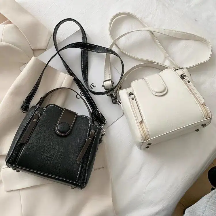 

Cross-body bag women's bag 2021 new Korean version fashion broadband leisure bucket bag texture lock one-shoulder portable bag