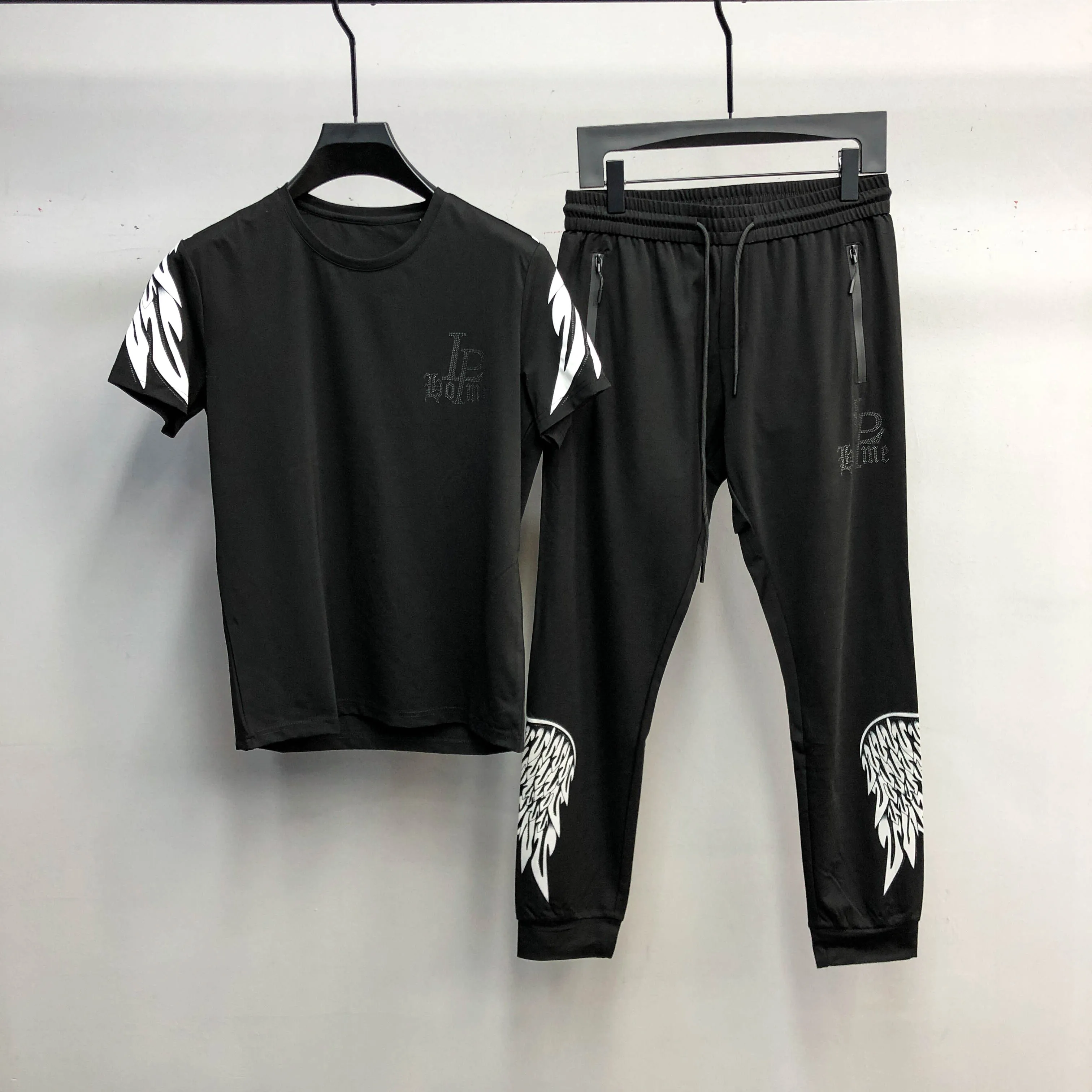 

European 2021 men's new summer suit personalized back wing print elastic sports short sleeve two piece suit fashion