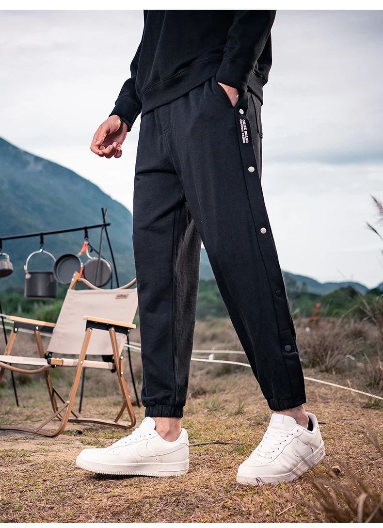 

3831 Korean version of the trend of loose track pants, buckle pants, street youth, breasted pants, autumn casual pants