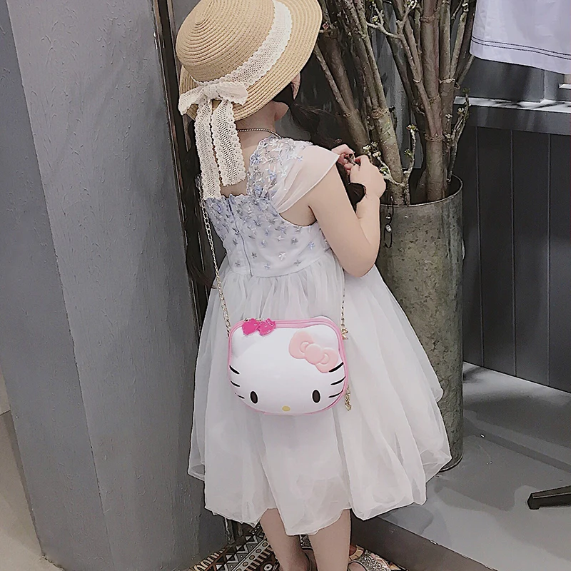 Подарок на день рождения - сумка через плечо принцессы с цепочкой и рисунком Hello Kitty для девочки.