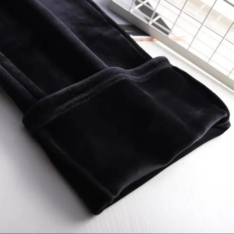 Женские утепленные флисовые брюки повседневные свободные расклешенные с