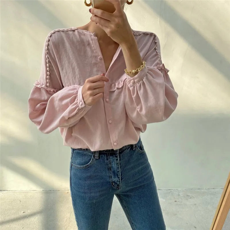 

RUGOD 2021 spring long-sleeved single-breasted shirt with sweet pleated wood ears