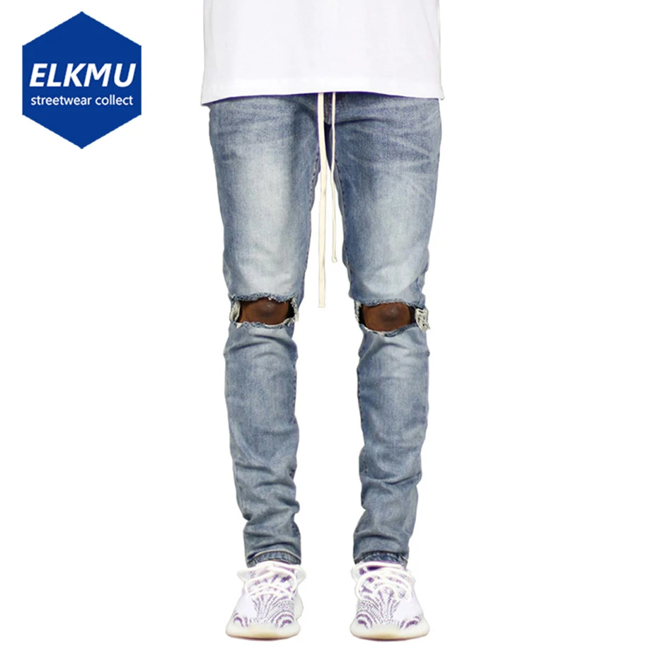 

Синие рваные джинсы в стиле хип-хоп, уличная одежда, модные облегающие джинсовые брюки с потертостями и дырками, мужские брюки с потертостям...