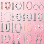 Женские серьги-гвоздики серебряного цвета с круглыми фианитами