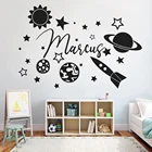 Наклейка на стену в виде планеты со звездами и ракетами