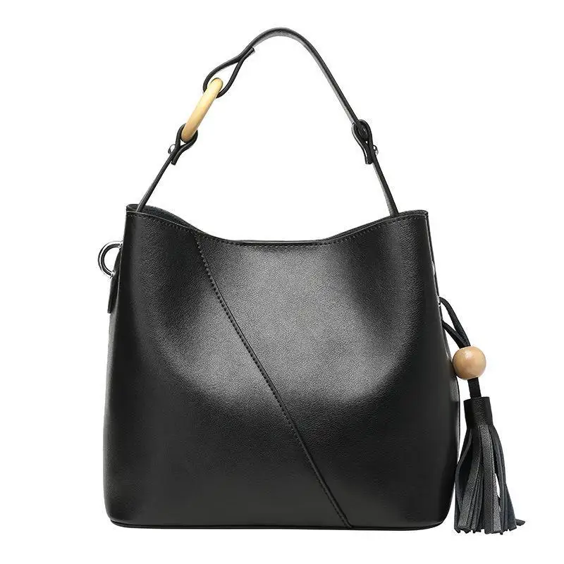 

Johnature Fashion Women Bucket Bag 2021 New Simple Tassel Versatile Cow Leather Shoulder Bags Leisure Solid Color Messenger Bag