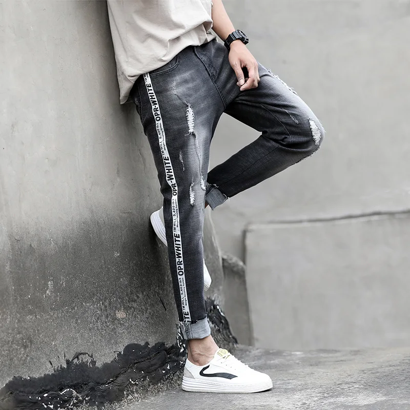 

Spring summer ripped holes pencil jeans men's Korean trendy grey youth slim feet pants side striped teenagers cowboy men's pants