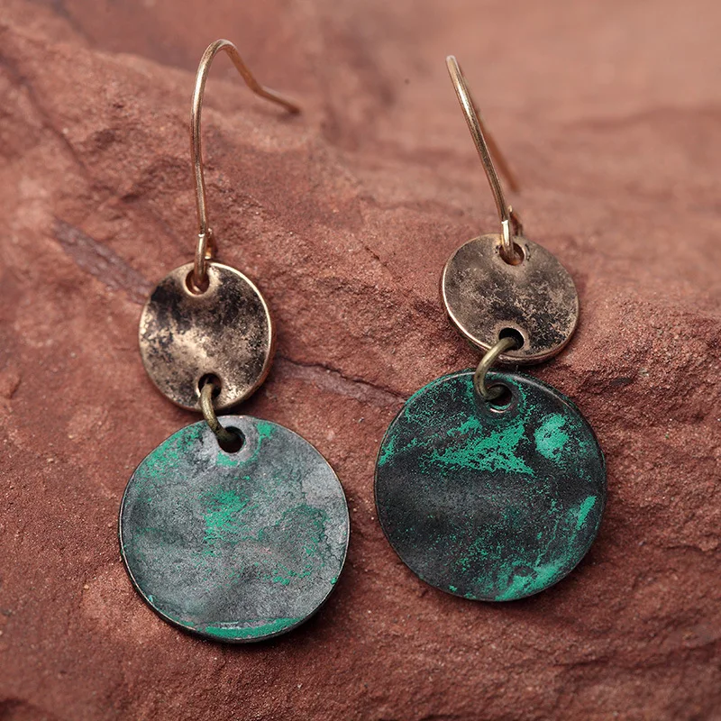 

New earrings European and American retro original Earrings sold quickly cross border popular Coin Ring splicing two color lady