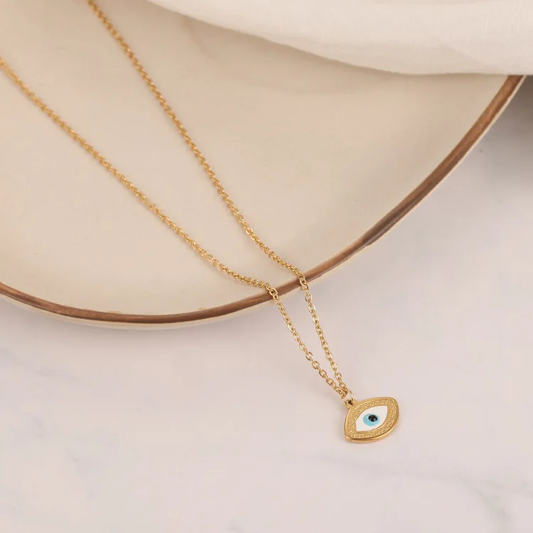 Очаровательное ожерелье с падающим овальным подвесом, украшенное титановой сталью 18К позолотой и персональной креативностью глаза через границу в Европе.