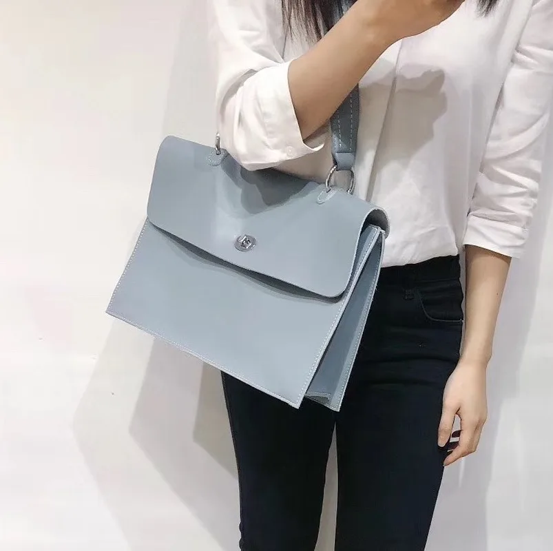 

The New Genuine Leather Casual fashion Simplicity Solid color Commute All-match Women's Shoulder Bags handbag Small briefcase