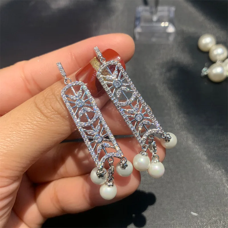 

Fashion custom micro-inlaid zircon earrings retro hollow shield pearl earrings