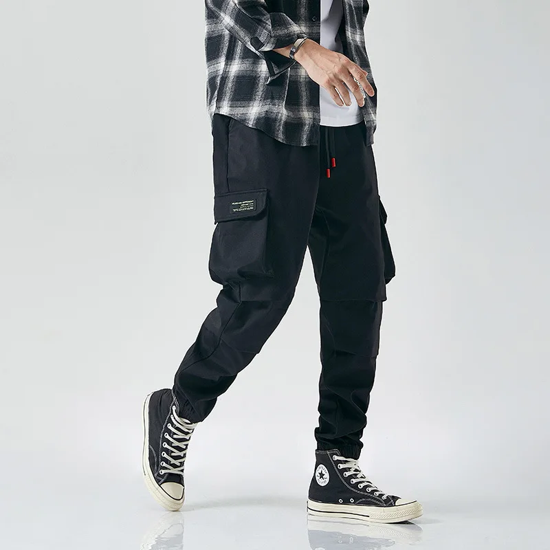 

2021 Spring Leisure Sports Pants Men's Loose Large Japanese Corset Harem Pants Work Clothes Leisure Capris Men's Fashion Brand