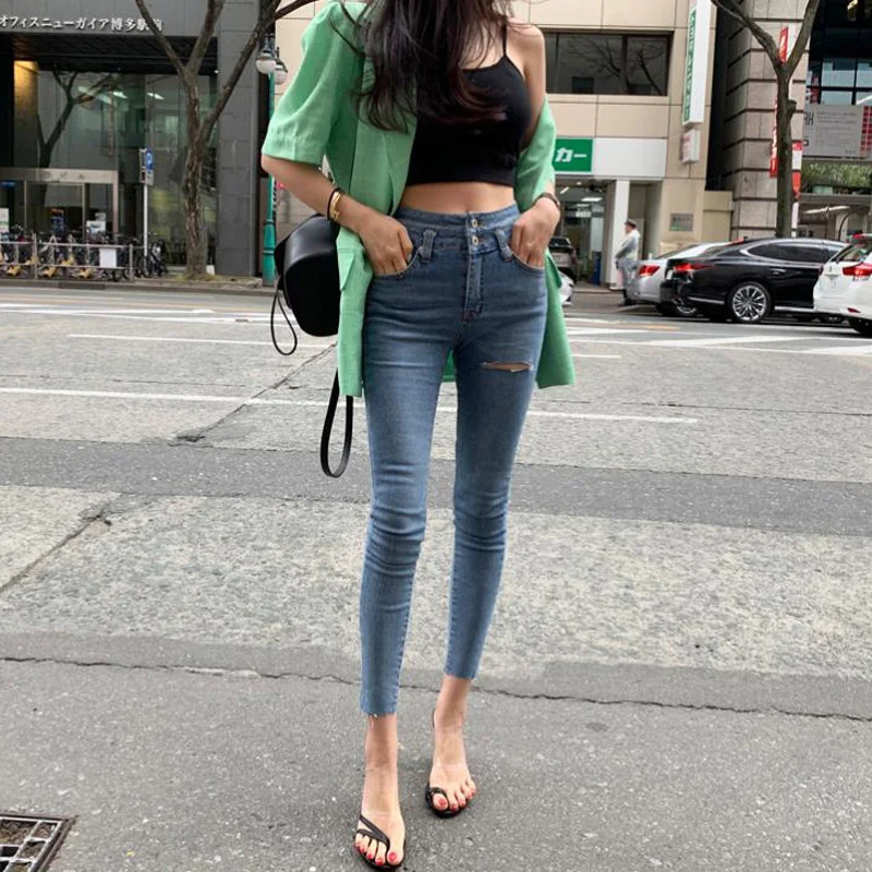 Женские рваные джинсы с высокой талией эластичные узкие бахромой на подоле