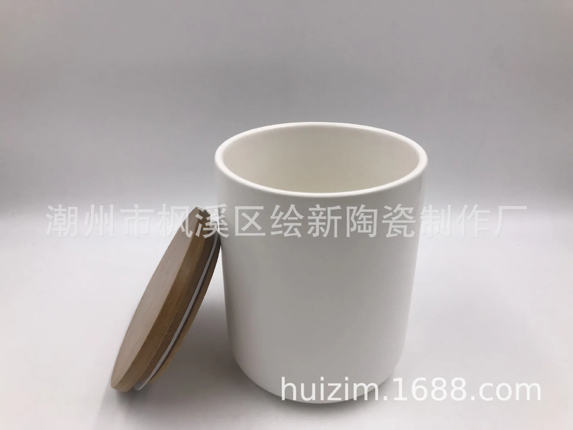 

Dolomite matt white round bottom ceramic sealed jar with bamboo lid silicone sealed storage jar biscuit box set