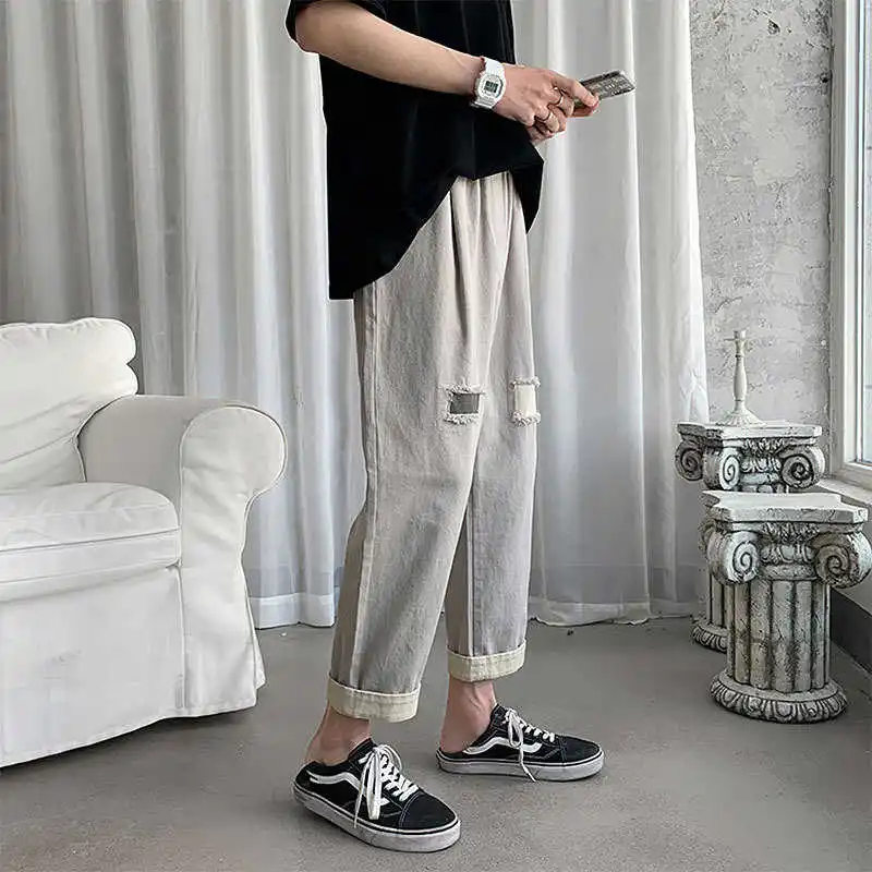 

Overalls men's pants casual pants Korean fashion BF Harajuku fashion brand net red hole loose straight pants