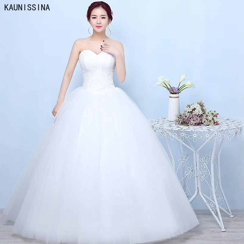Фото KAUNISSINA Дешевые Свадебное платье с корсетом без Рукавов шифоновые пляжные