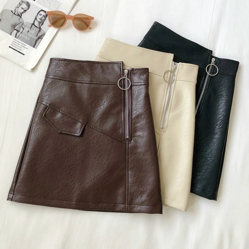 Осенне зимняя женская юбка одноцветная на молнии с карманом из искусственной