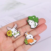 big eared rabbit enamel pins rabbit biting flower brooch custom cute animal shape brooch lapel badge bag cartoon jewelry