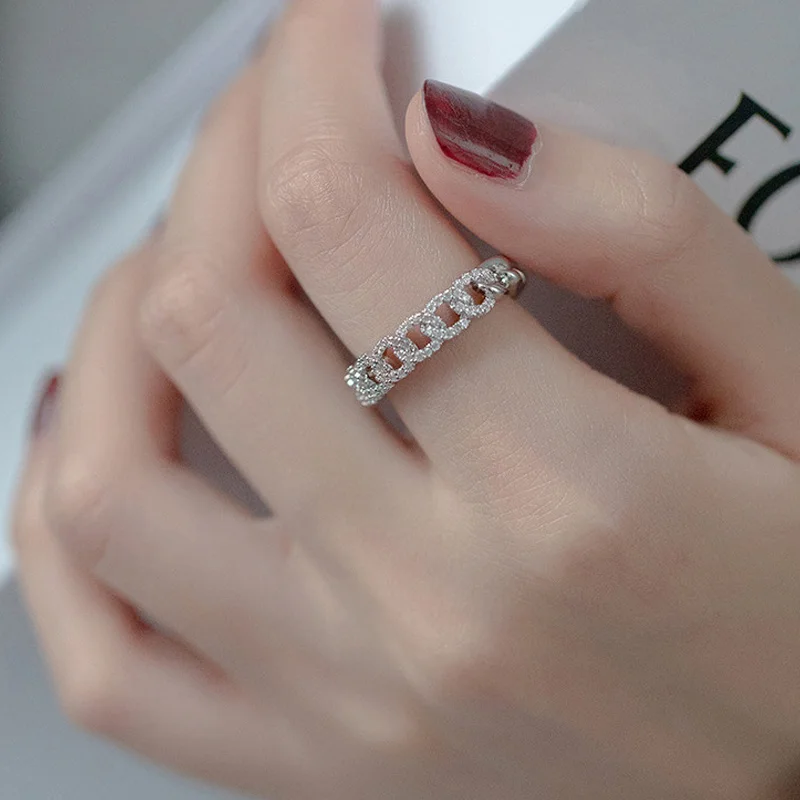 Открытое кольцо в форме сердца с отверстиями серебряного цвета дизайнерское