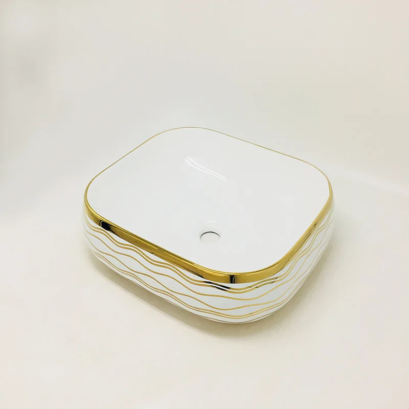 

bathroom accessori gold-plated above counter basin wash bathroom wash basin single hole basin gold flower striped wash basin