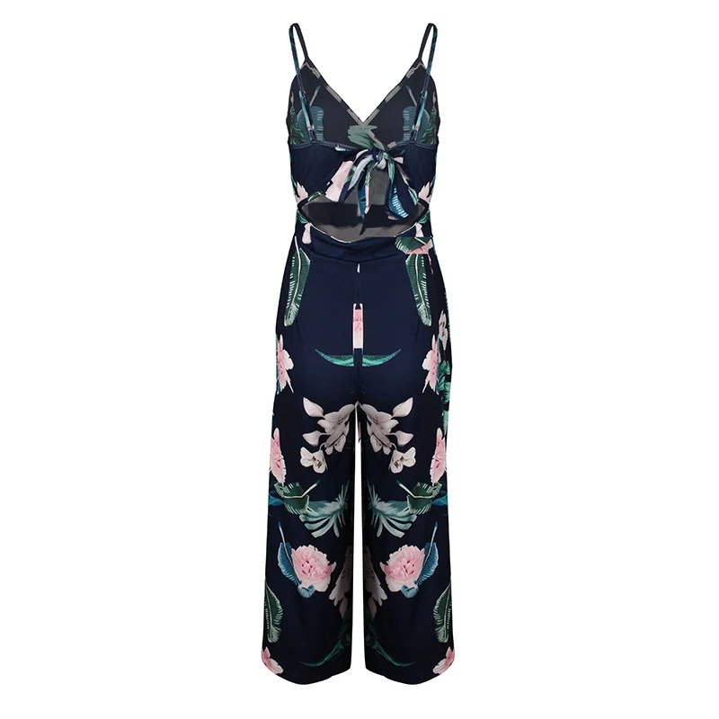 Nadafair Boho Цветочные Комбинезоны для женщин V образным вырезом спинки Лук ремень Летний Пляжный комбинезон длинные брюки