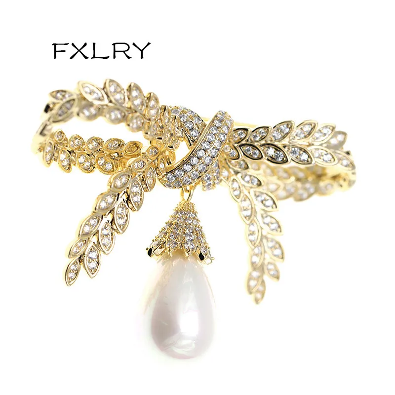 

FXLRY Personality Fashion inlaid AAA zircon pearl Bowknot brooch for women Suit Coat Accessories