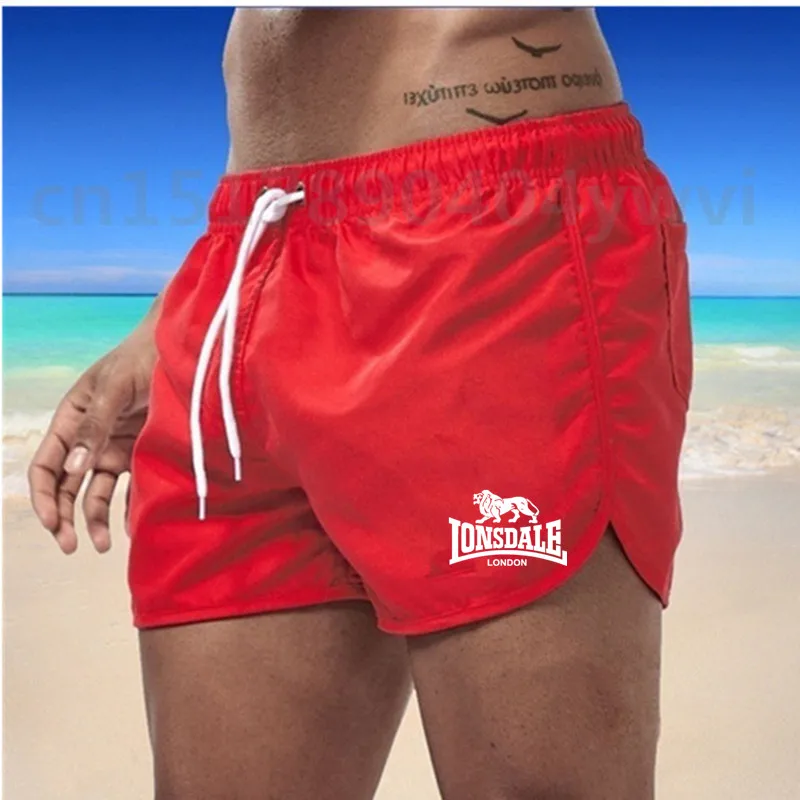 

2021 Summer Gyms Fitness Hot Shorts Men's Solid Color Shorts Men's Summer Loose Breathable Casual Shorts Beach Shorts Large Size