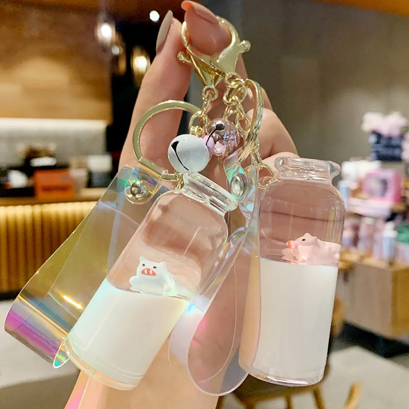 

Cute Floating Milk Pig Keyring Acrylic Milk Bottle Keychain Moving Liquid Quicksand Drift Bottle Women Bag Pendant Jewelry Gifts