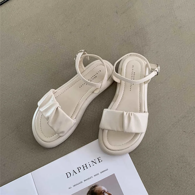 

Thick soled sandals female summer flat 2021 new Korean versatile student fairy one word buckle gentle Roman shoes