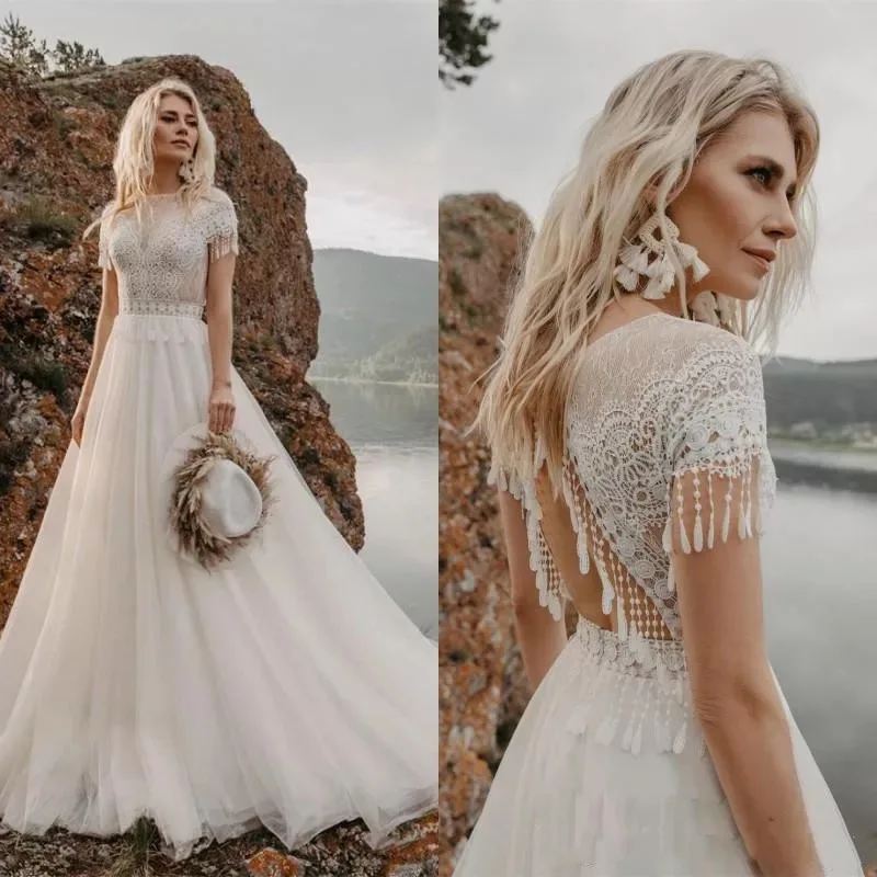 

Bohemain Lace Wedding Dresses With Tassel 2021 Boat Neck Short Sleeve Backless Sweep Train Boho A-Line Tulle Bridal Gown