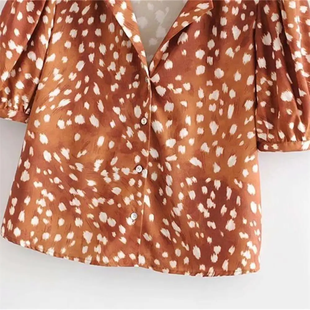 

Autumn 2019 women's new V-neck short sleeve shoulder pleated loose printed shirt 08673468700
