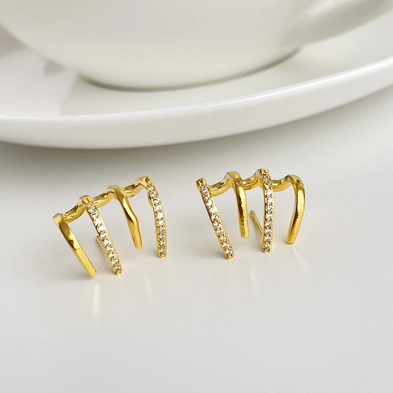 Нишевые дизайнерские геометрические серьги с четырьмя рядами когтей новые