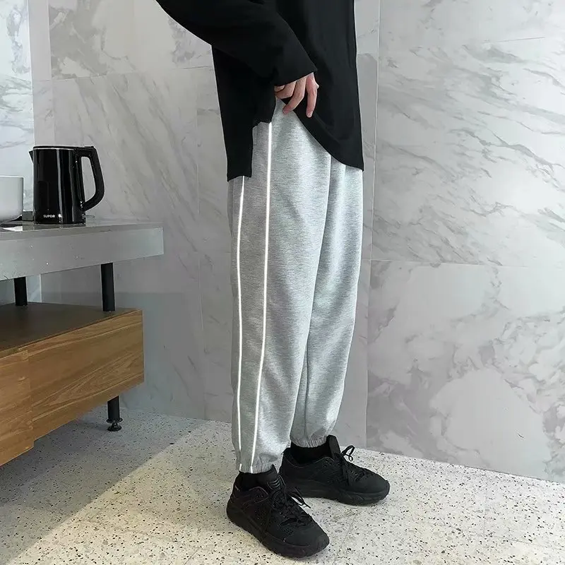 

Summer thin casual pants men's loose ins trend Hong Kong style solid color waisted nine-point pants reflective two-bar pants