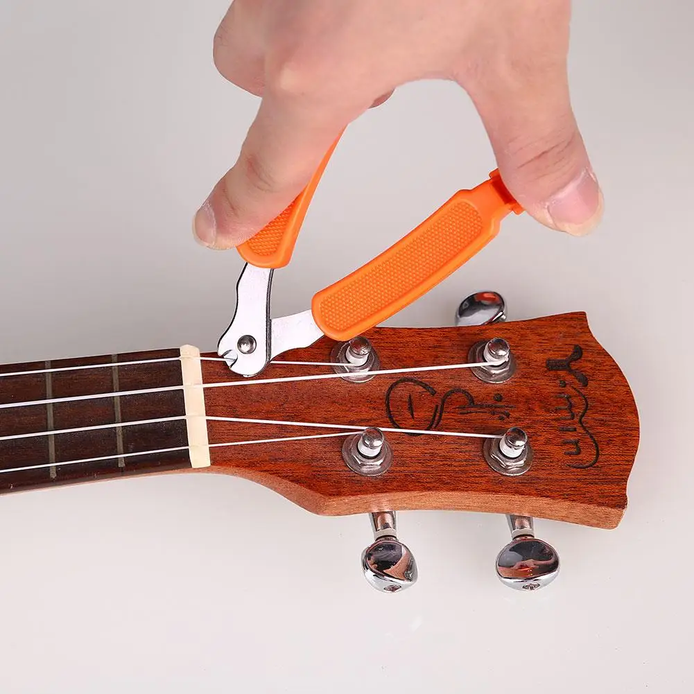 

Guitar Ukulele String Winder And Cutter Pin Puller Remover Musical Tool